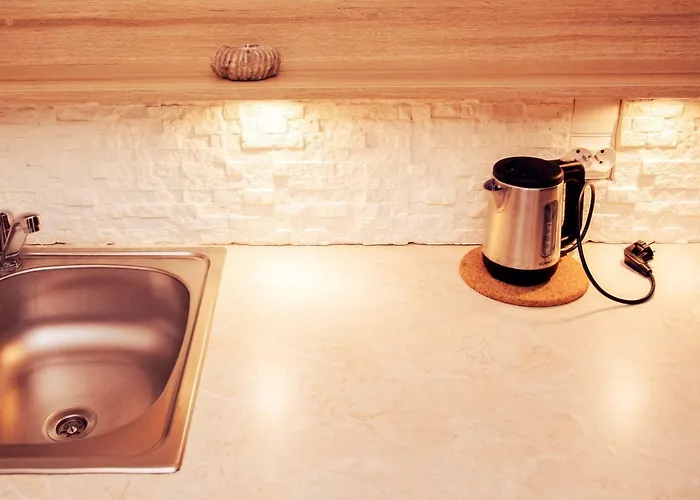 アパート Urlop Przy Wydmach ミエンジボジェ